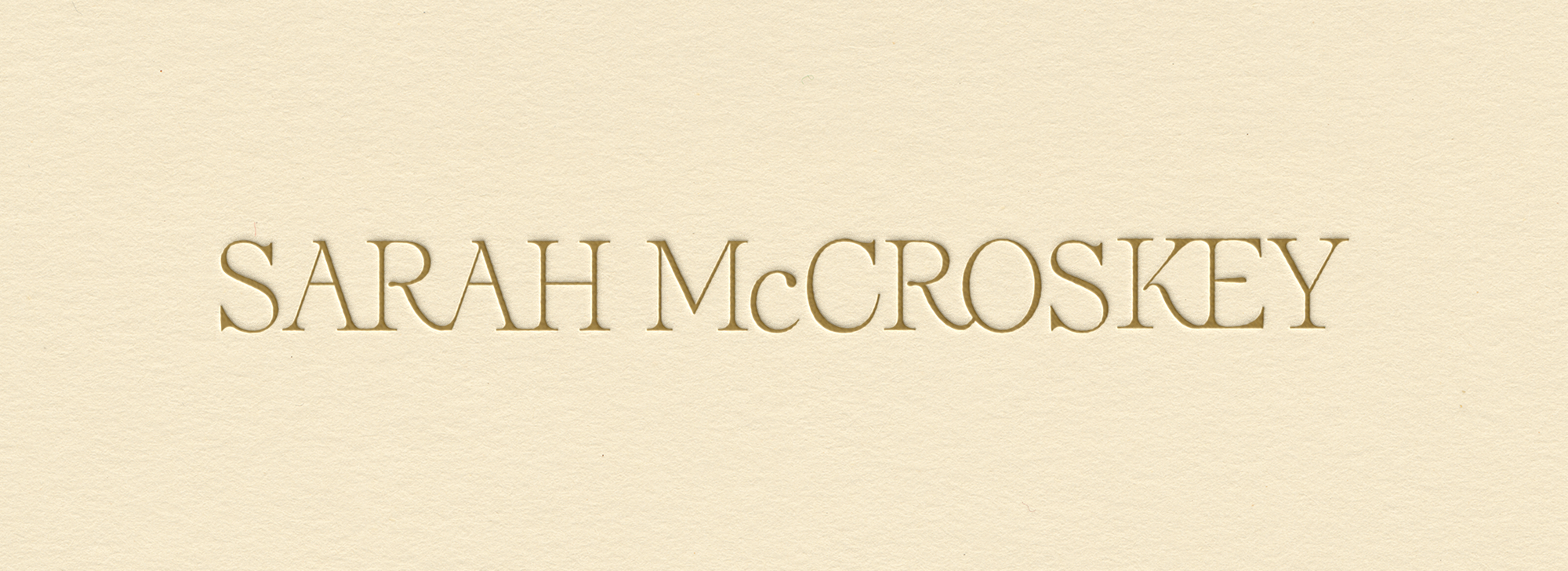 Branding for destination wedding photographer Sarah McCroskey with custom logo and brand identity